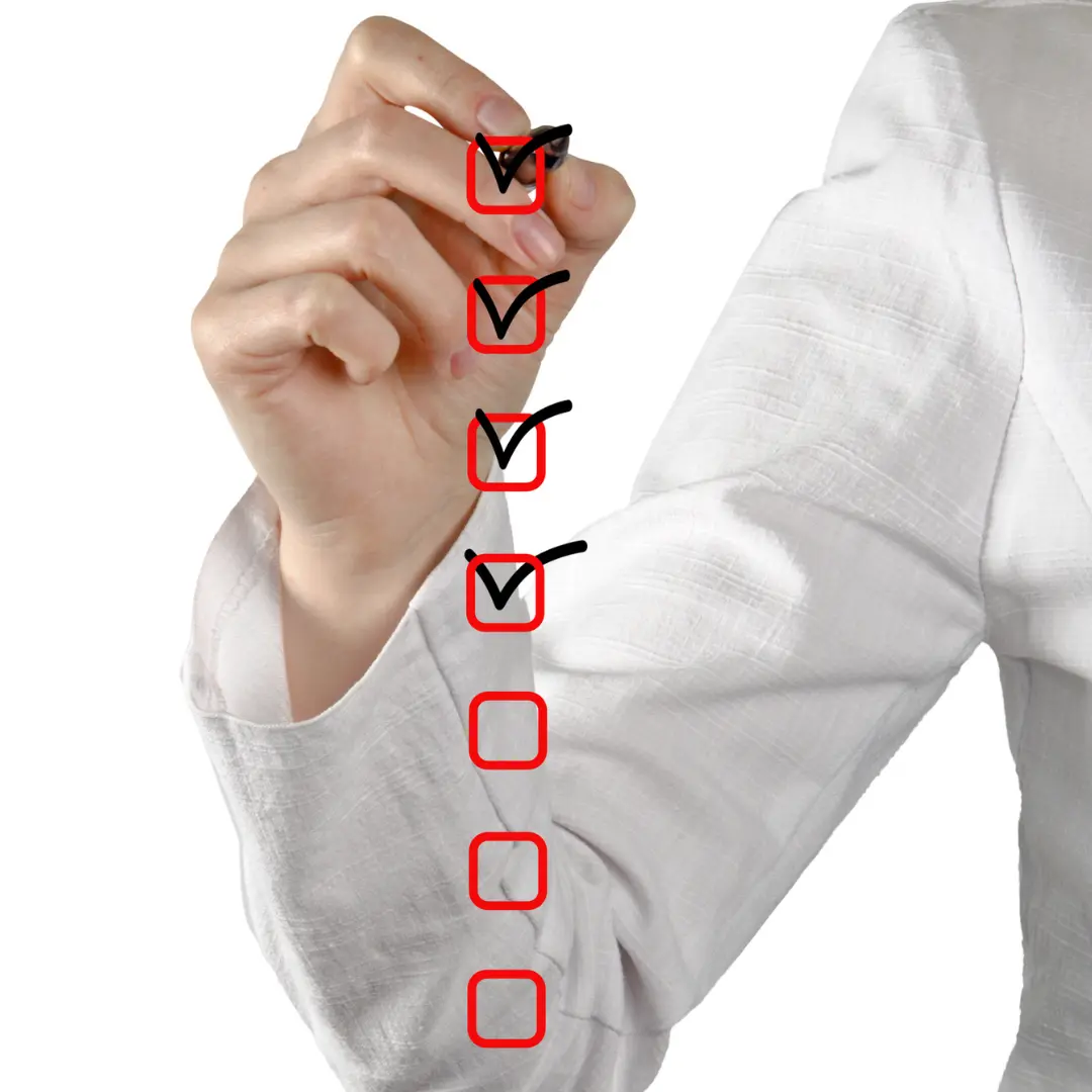 Sustainability Compliance Checklist Business professional marking a compliance checklist, symbolising verification, auditing and sustainability evidence requirements