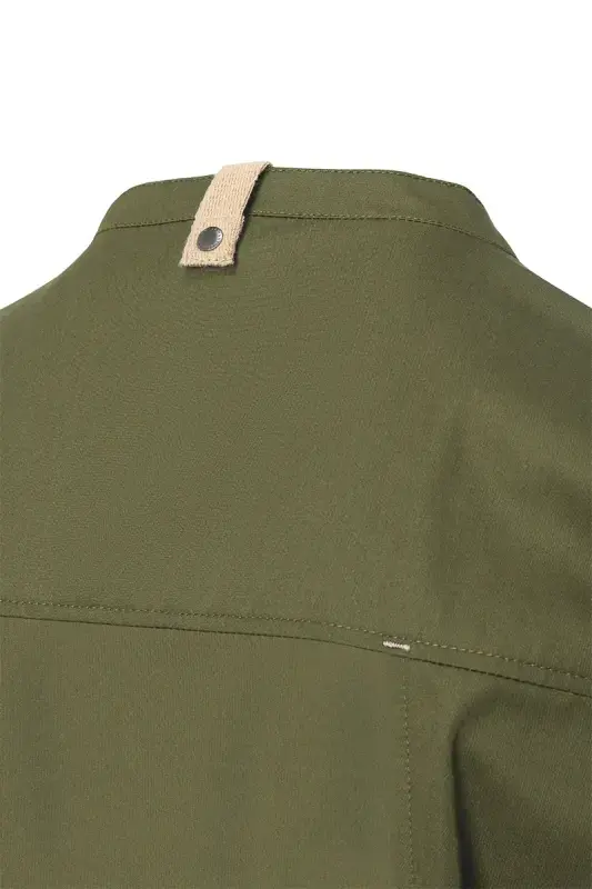 Chef jacket fabric and stitching detail for professional kitchen workwear